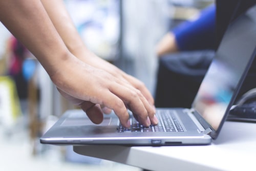 Business man using laptop computer