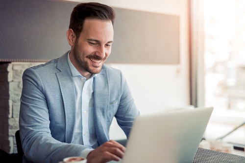 Portrait of Young Caucasian Businessman in Casual Shirt